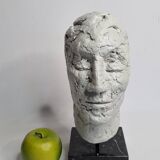 Clay sculpted head on marble base, 32 cm