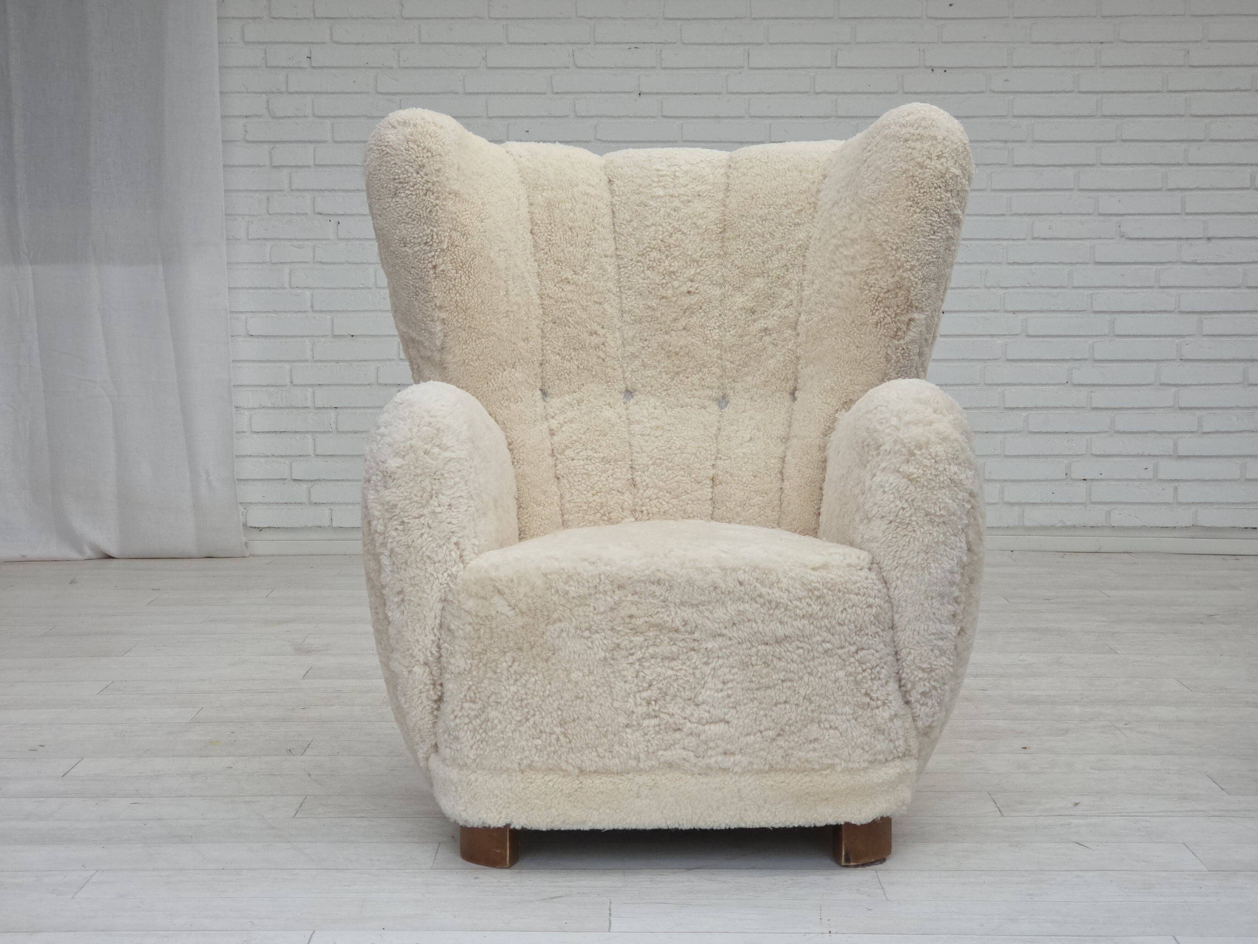 1960s, Danish design, reupholstered highback armchair, genuine sheepskin.