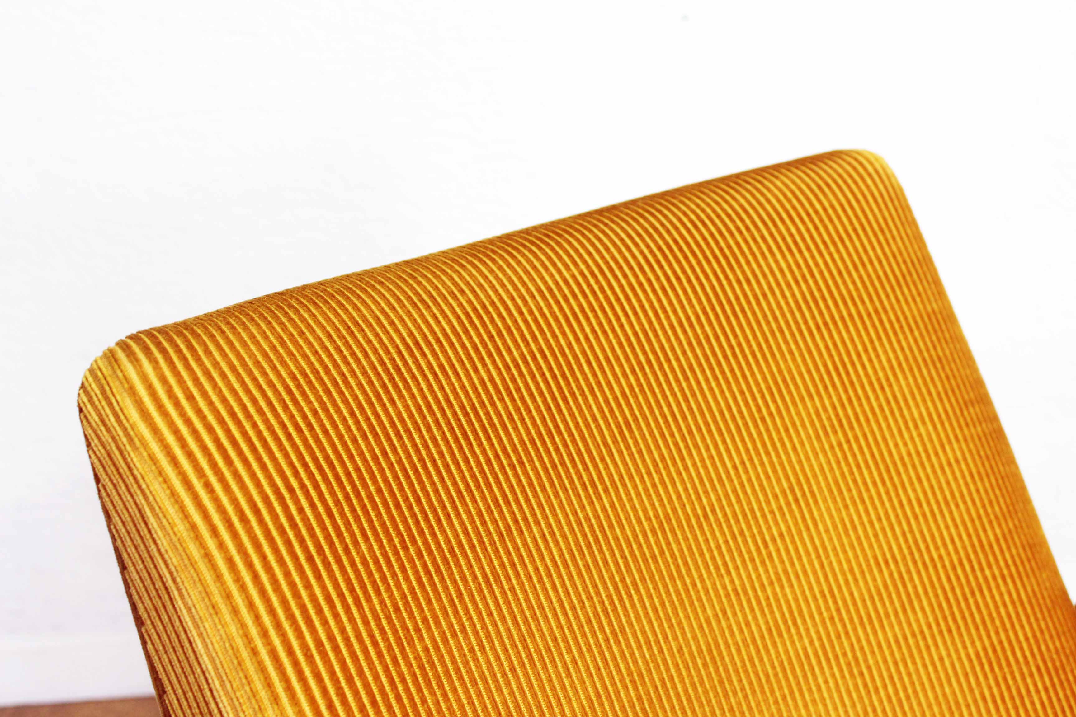 Scandinavian-designed chair in solid beech and mustard velvet