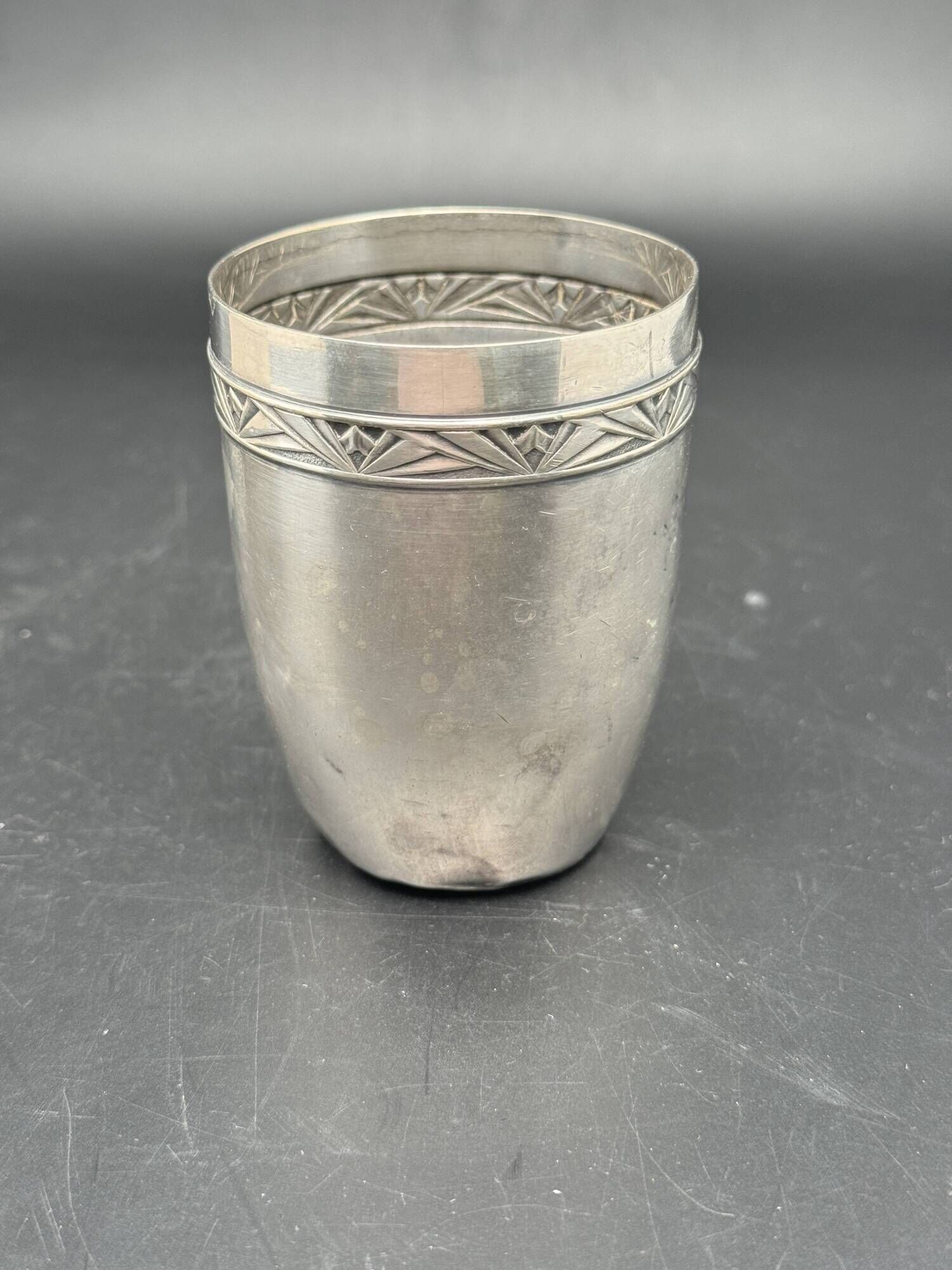 White metal (silverware) cup in its original box