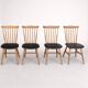 Set of 4 Baumann "Menuet" chairs – stained beech and black faux leather – French design