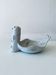 Large empty pocket or cup made of bird ceramic