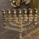 Chandelier, seven-branched menorah, in brass.