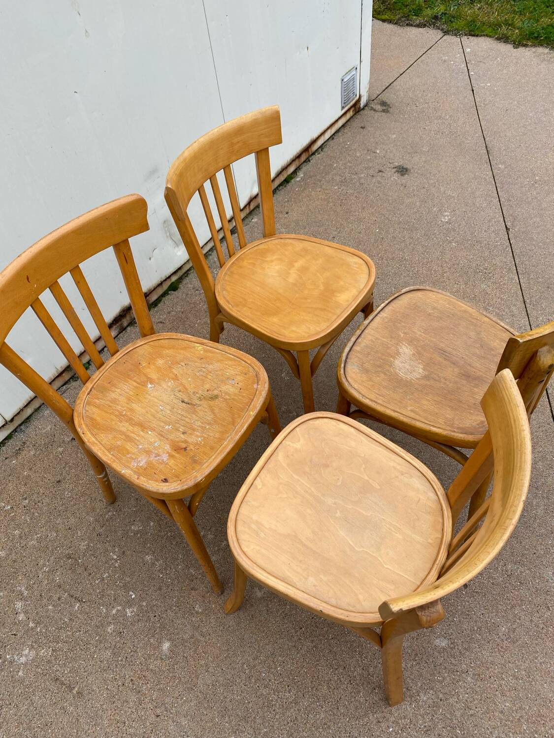 Curved varnished bistro chairs