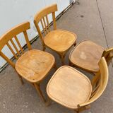 Curved varnished bistro chairs