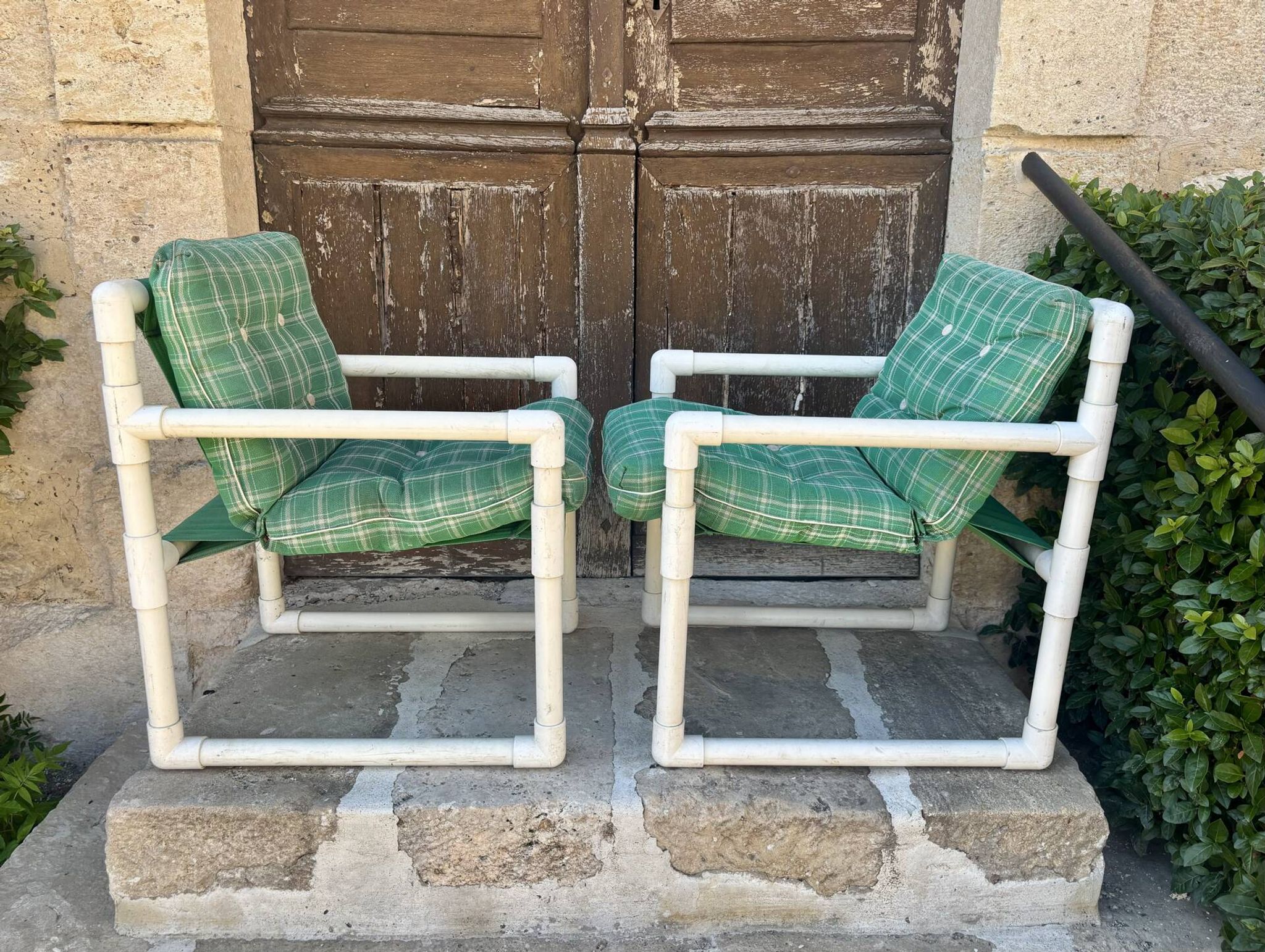 Pair of vintage tubular armchairs from the 70s and 80s, luxury design.