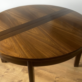 Table with an oak veneer and butterfly extension.