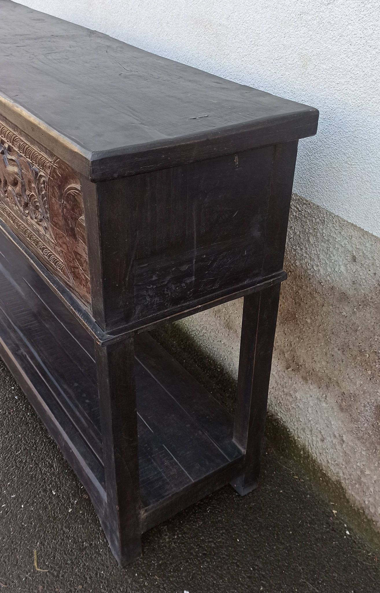 Console in old black wood with integrated chest