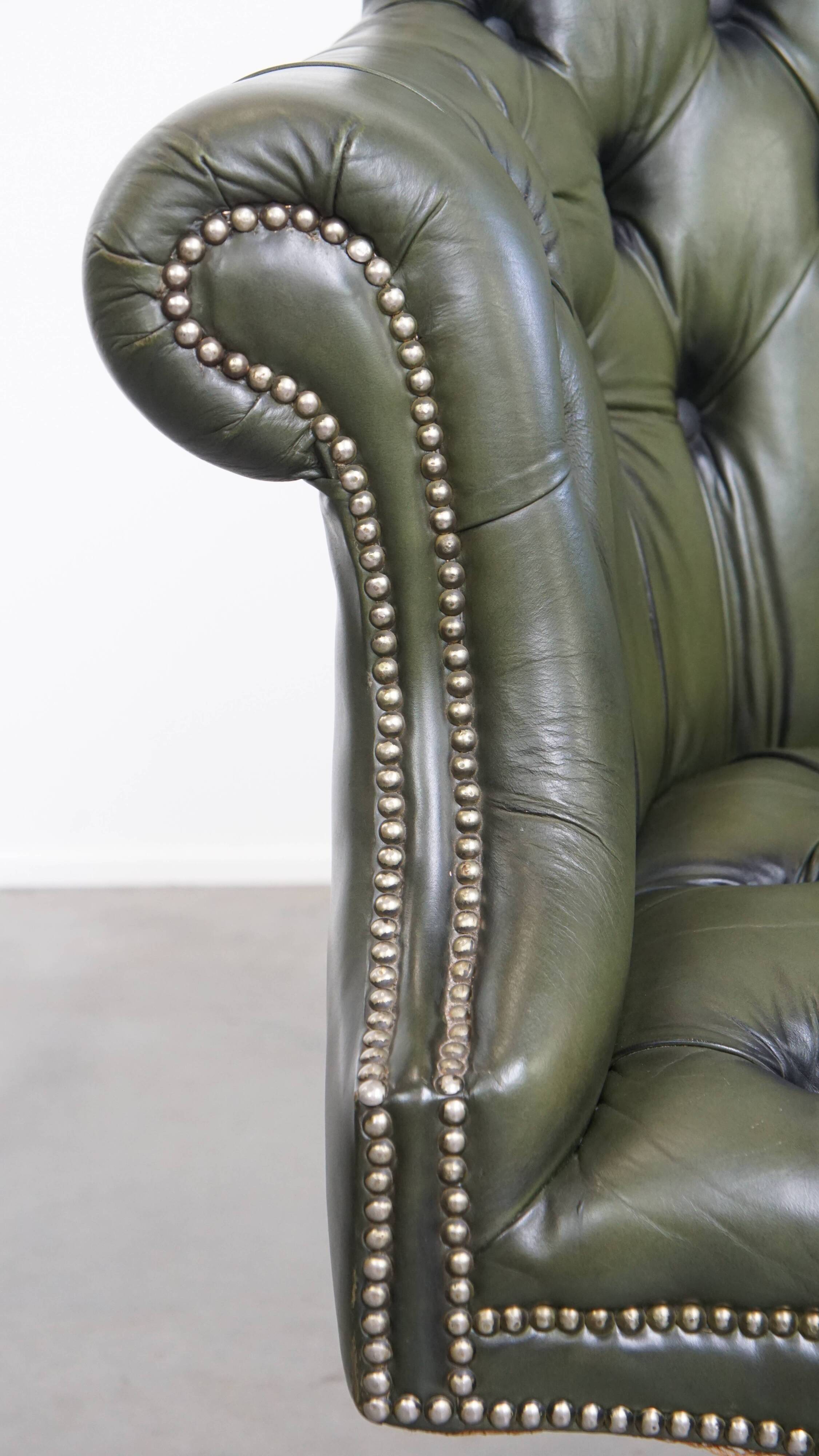 Chesterfield office chair in green cowhide leather on casters with high back