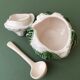 Saucière or condiment pot in cabbage-shaped slip, ceramic spoon