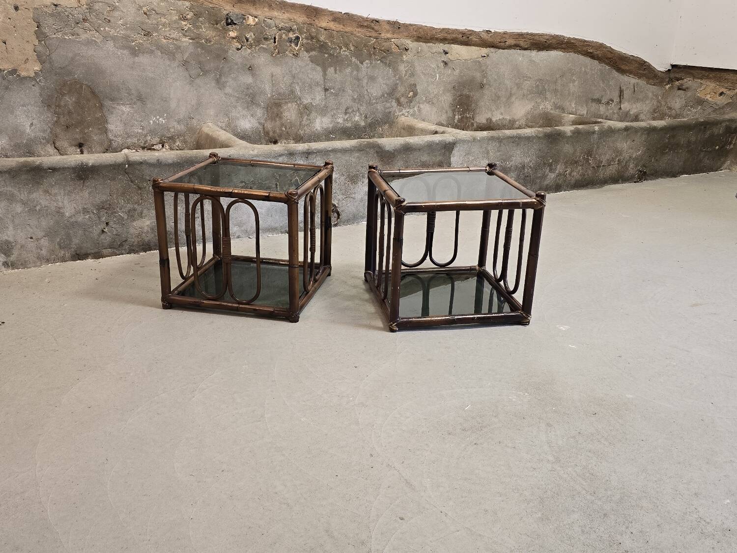 Two rattan and smoked glass tables, 1970