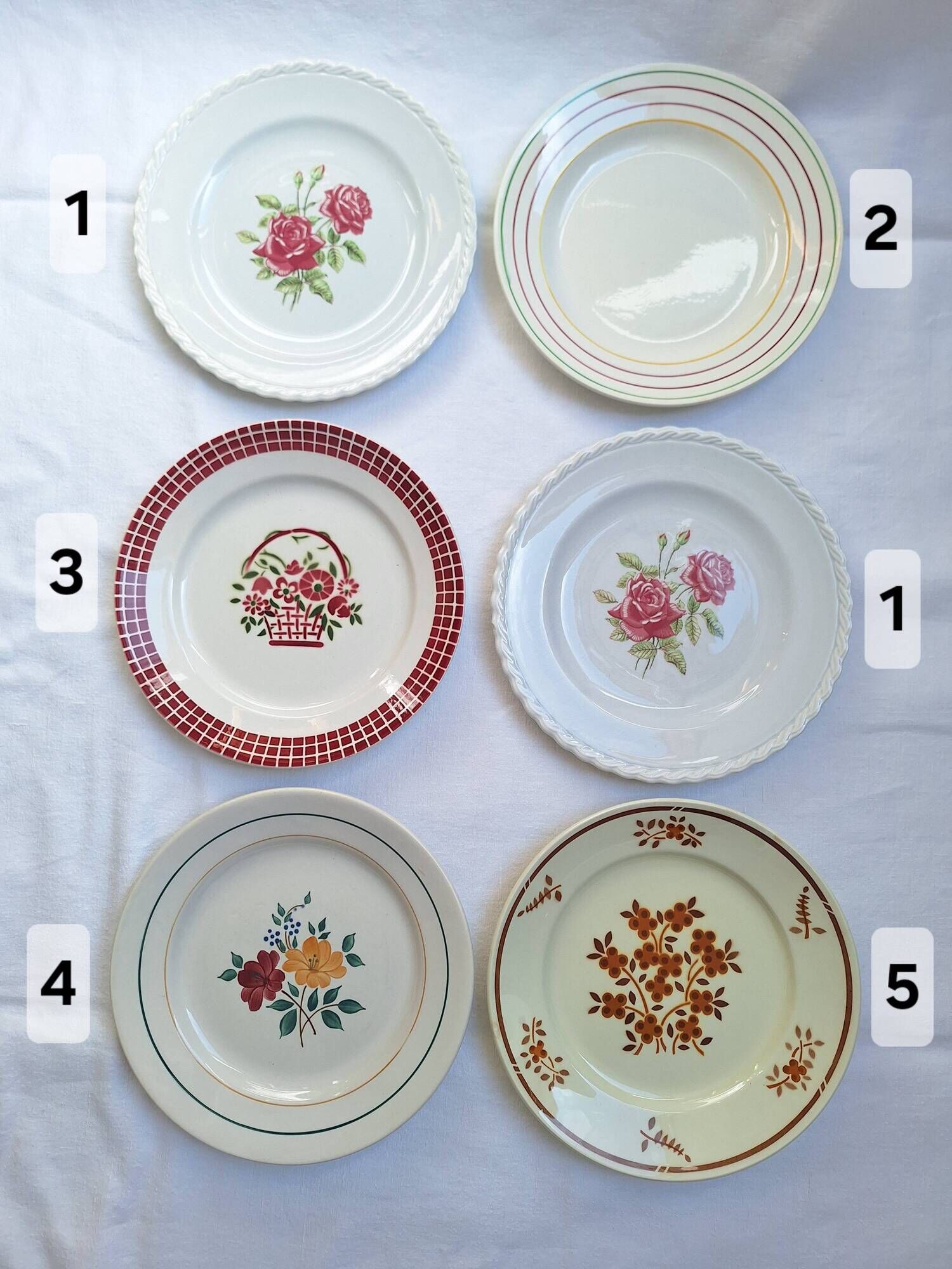 Multicolored flower dinner plates from Moulin des Loups, St Amand and Badonville