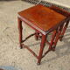 Nesting tables in ironwood with engraved decoration and gold highlights