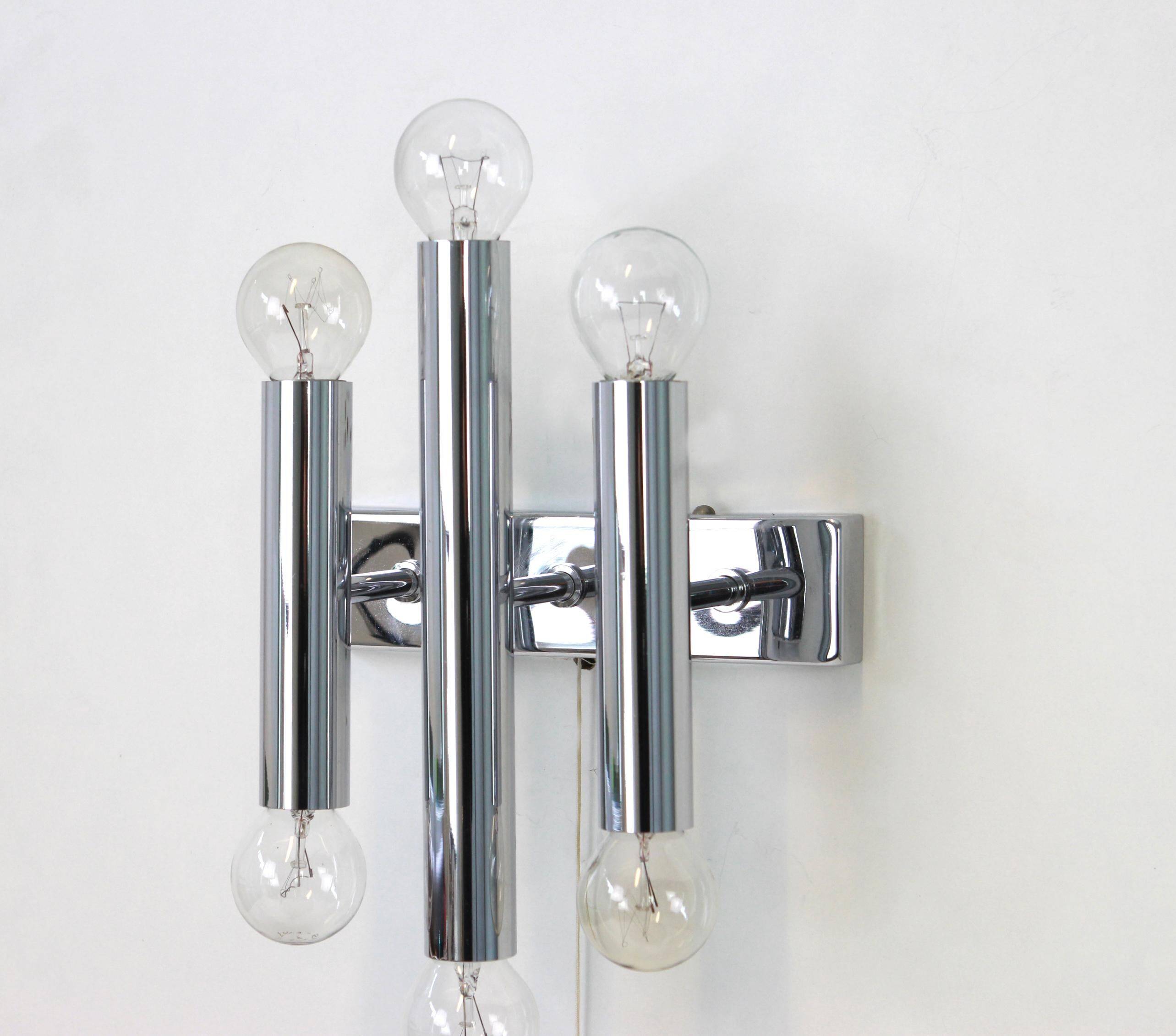 Pairs of Italian chrome wall sconces in the Sciolari style, 1970s.