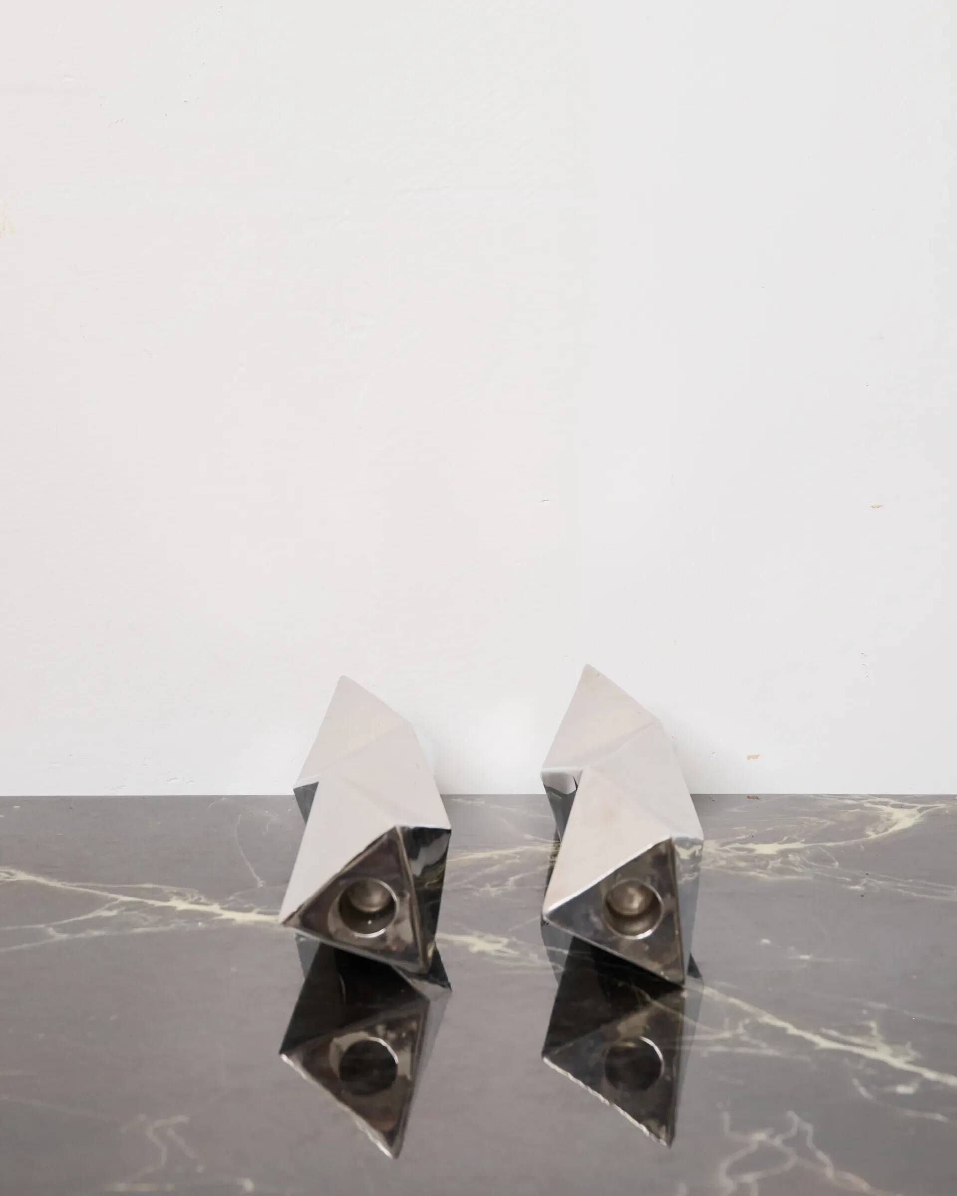 "Origami" pair of candlesticks in aluminium cast, 1970s