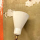 Wall lamp in brass and with three lights.  Italy 50s