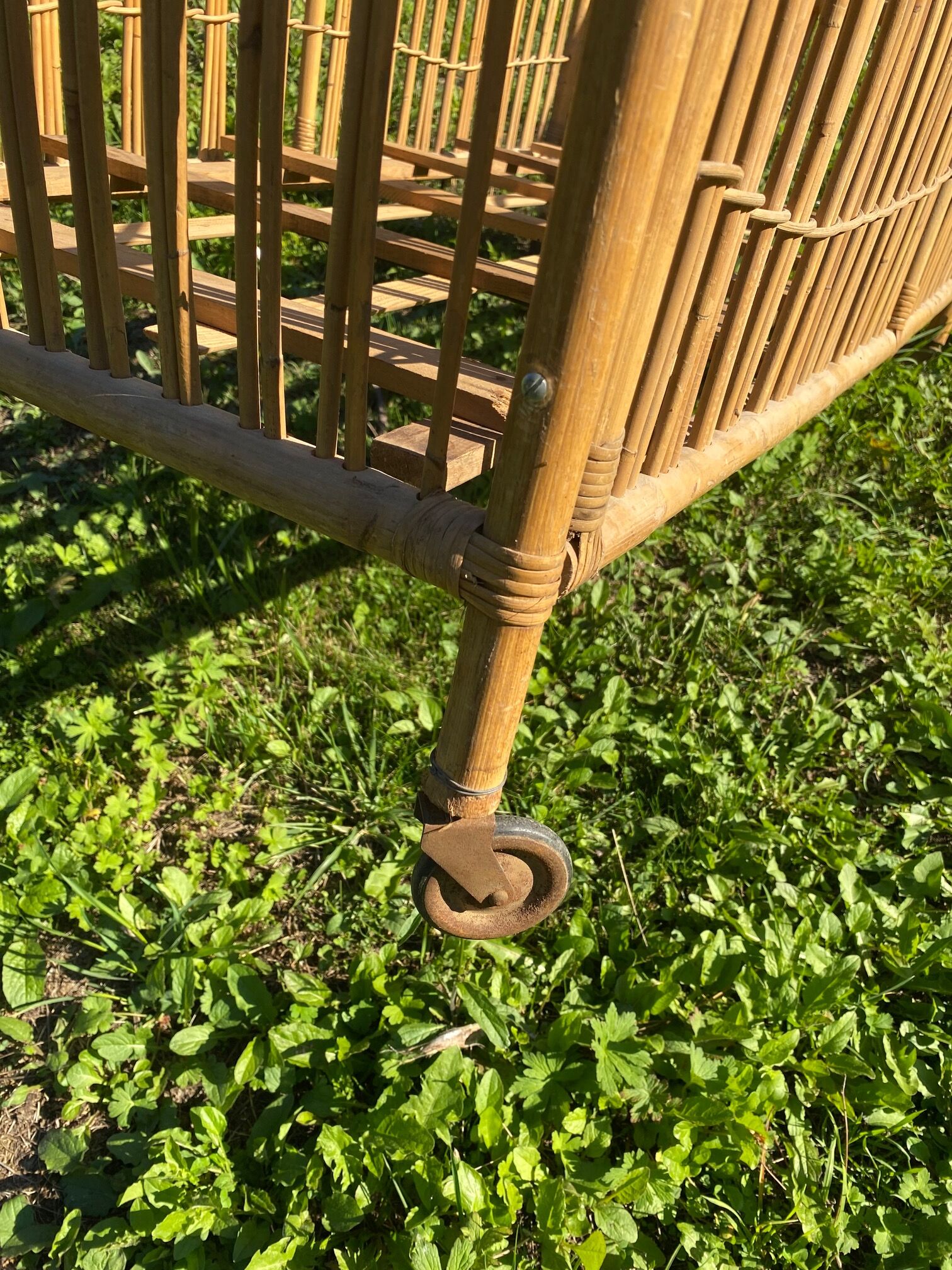 Children's bed in vintage rattan