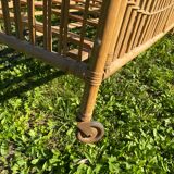 Children's bed in vintage rattan