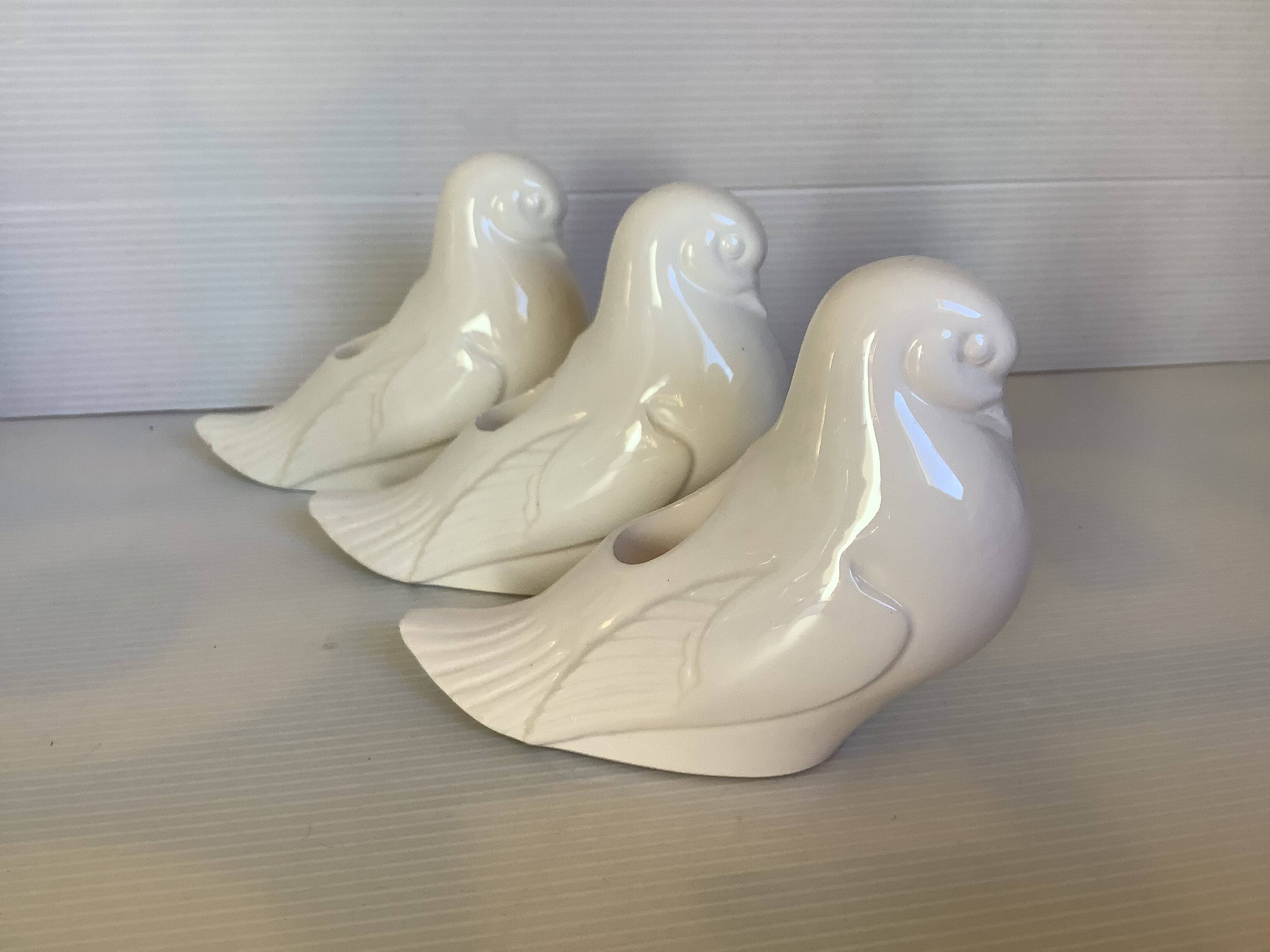 Seven dove bird candle holders