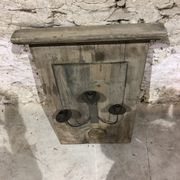 Decorative wall lamp in old wood