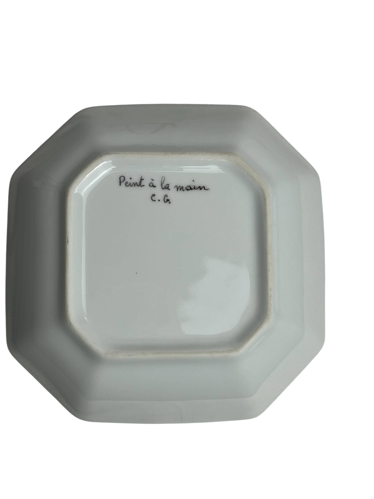 Octagonal empty pocket dish, hand-decorated earthenware, 20th century.