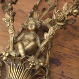 Wall lamp in bronze cherub