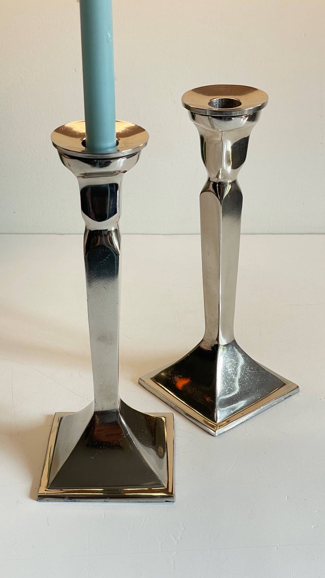 Pair of vintage cast aluminum candlesticks