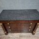Empire commode in mahogany and flame mahogany veneer, 19th century.