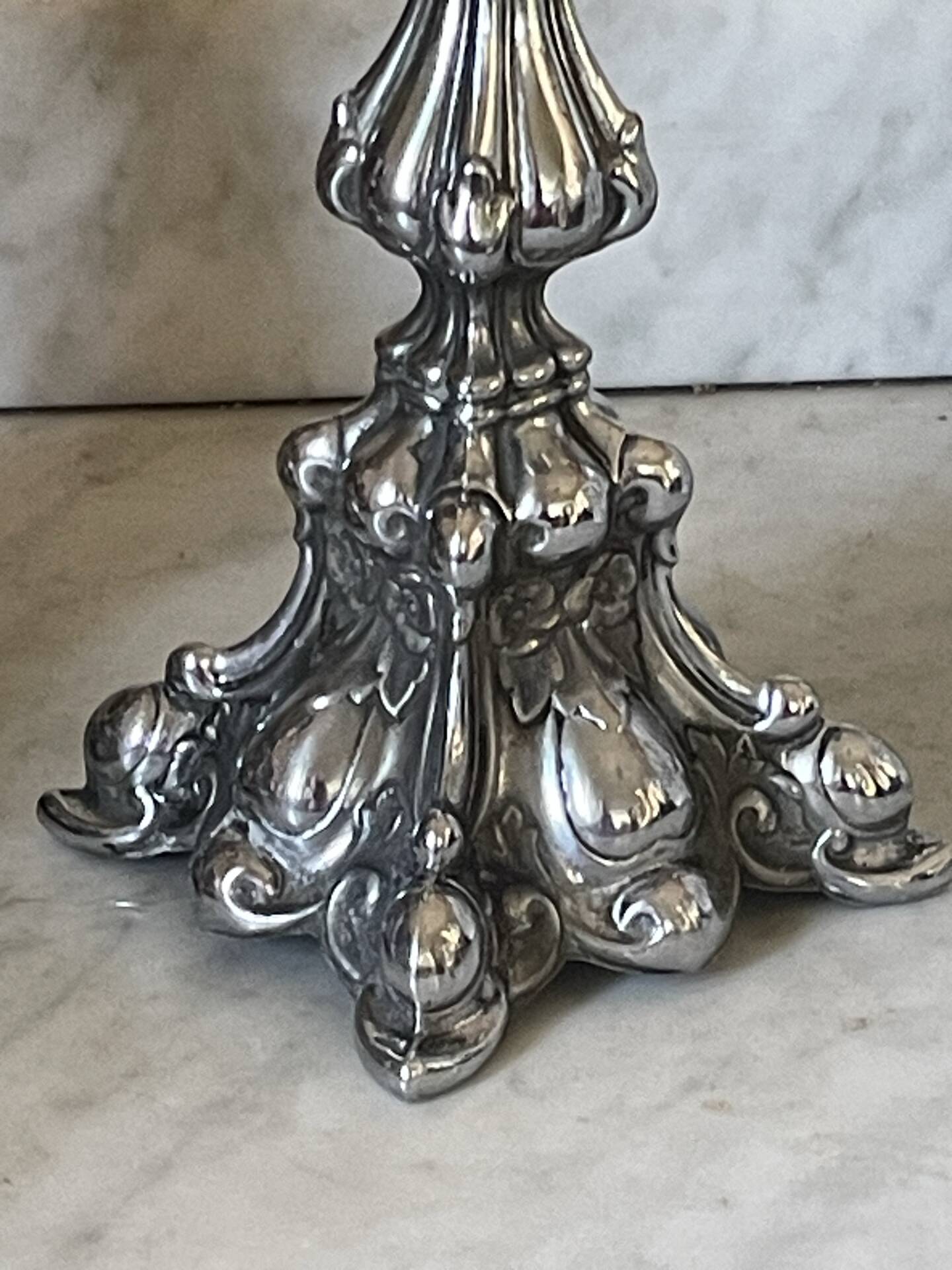 Pair of rococo silver-plated candlesticks