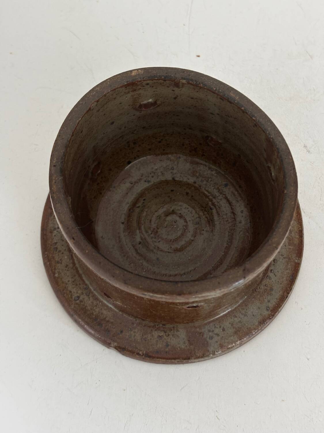 Glazed pottery water butter dish