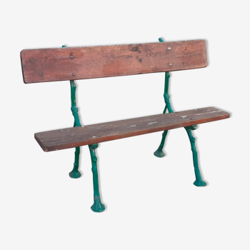 Garden bench with old cast iron feet