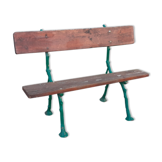 Garden bench with old cast iron feet