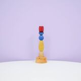 multi colored wooden candlestick