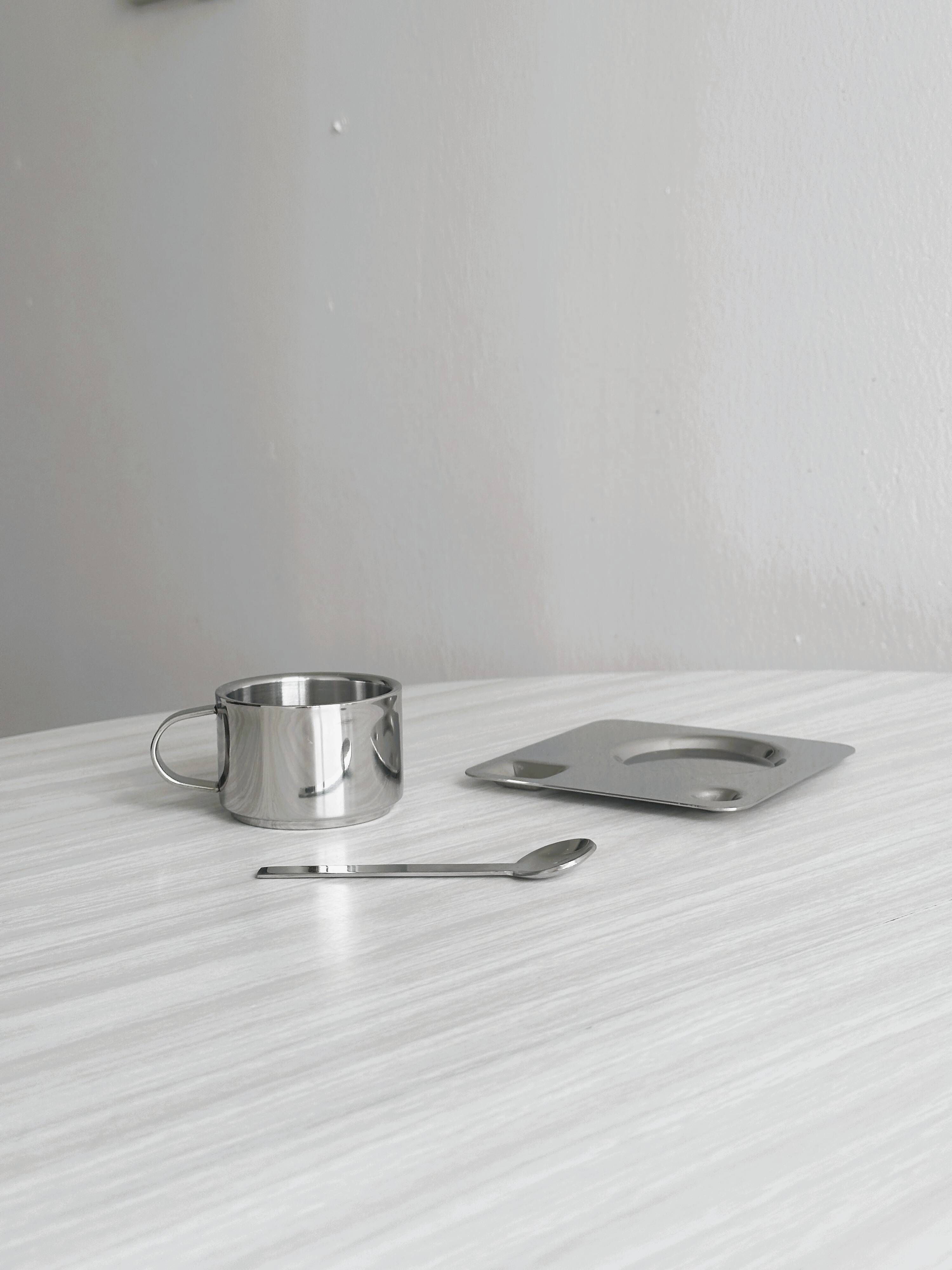 2 stainless steel espresso cups with tray and spoon