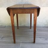 Round table at 2 vintage wood rabats