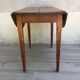 Table ronde à 2 rabats en bois vintage