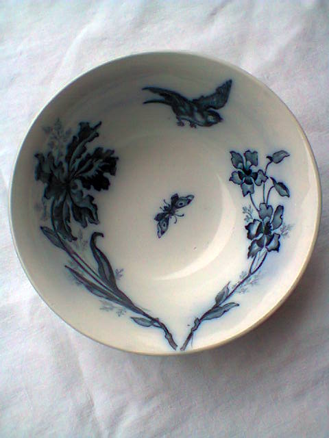Ramekin in earthenware with decoration of flowers, butterflies and birds