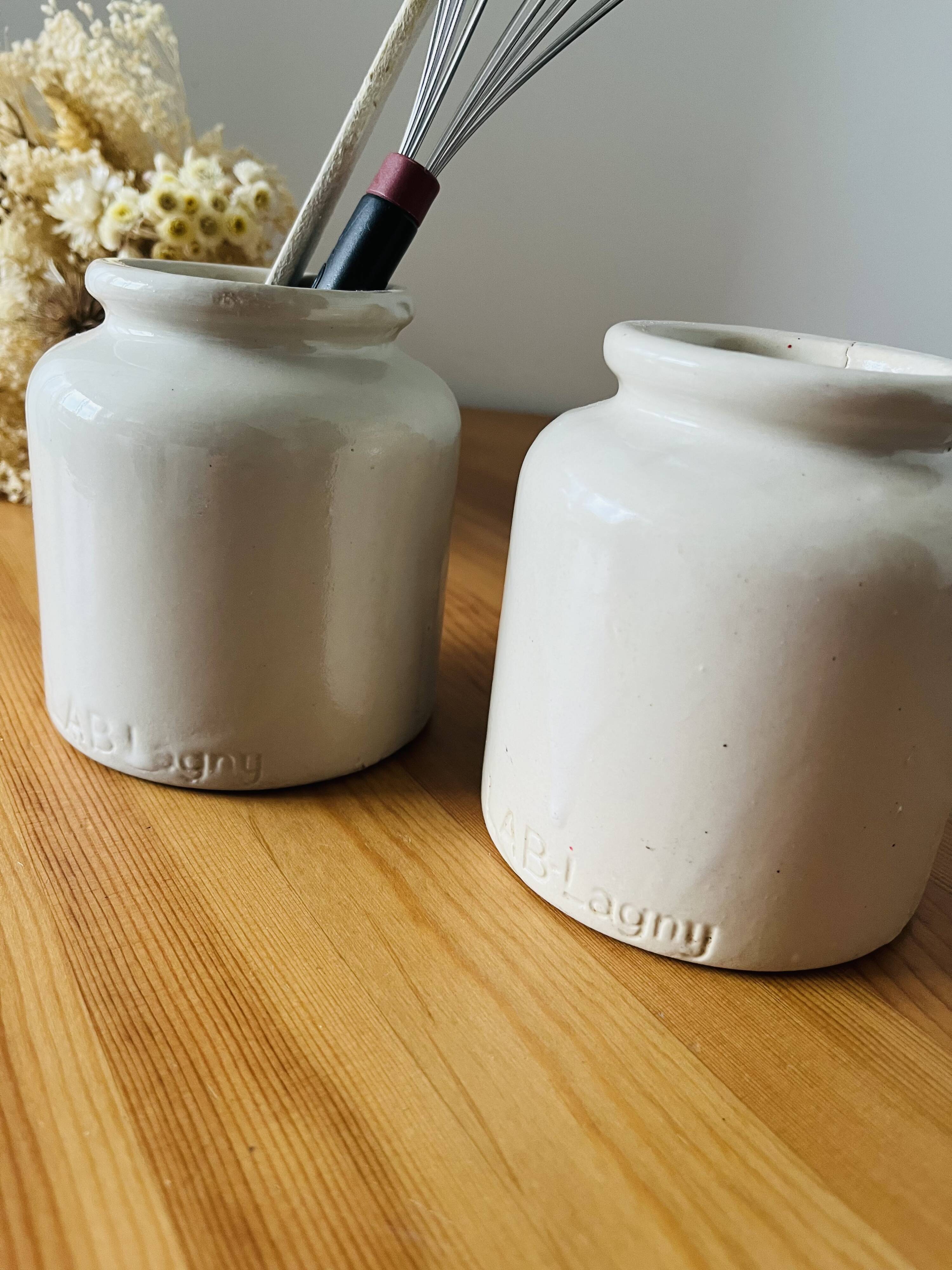 Ancient sandstone mustard pots