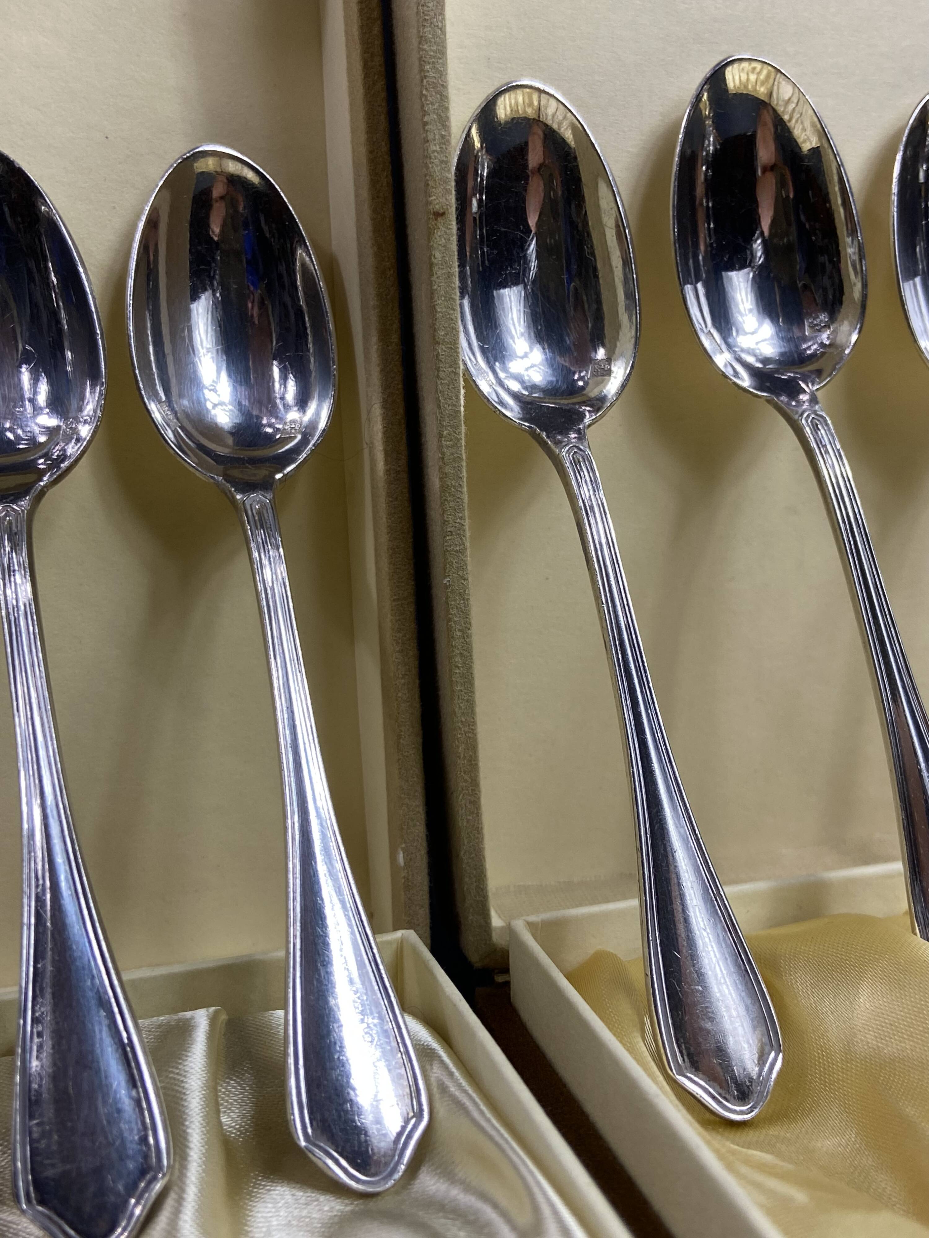 Complete set of 12 Louis XV style mocha spoons in silver-plated metal, Hermès