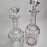 Set of two carved crystal decanters, 24 cm