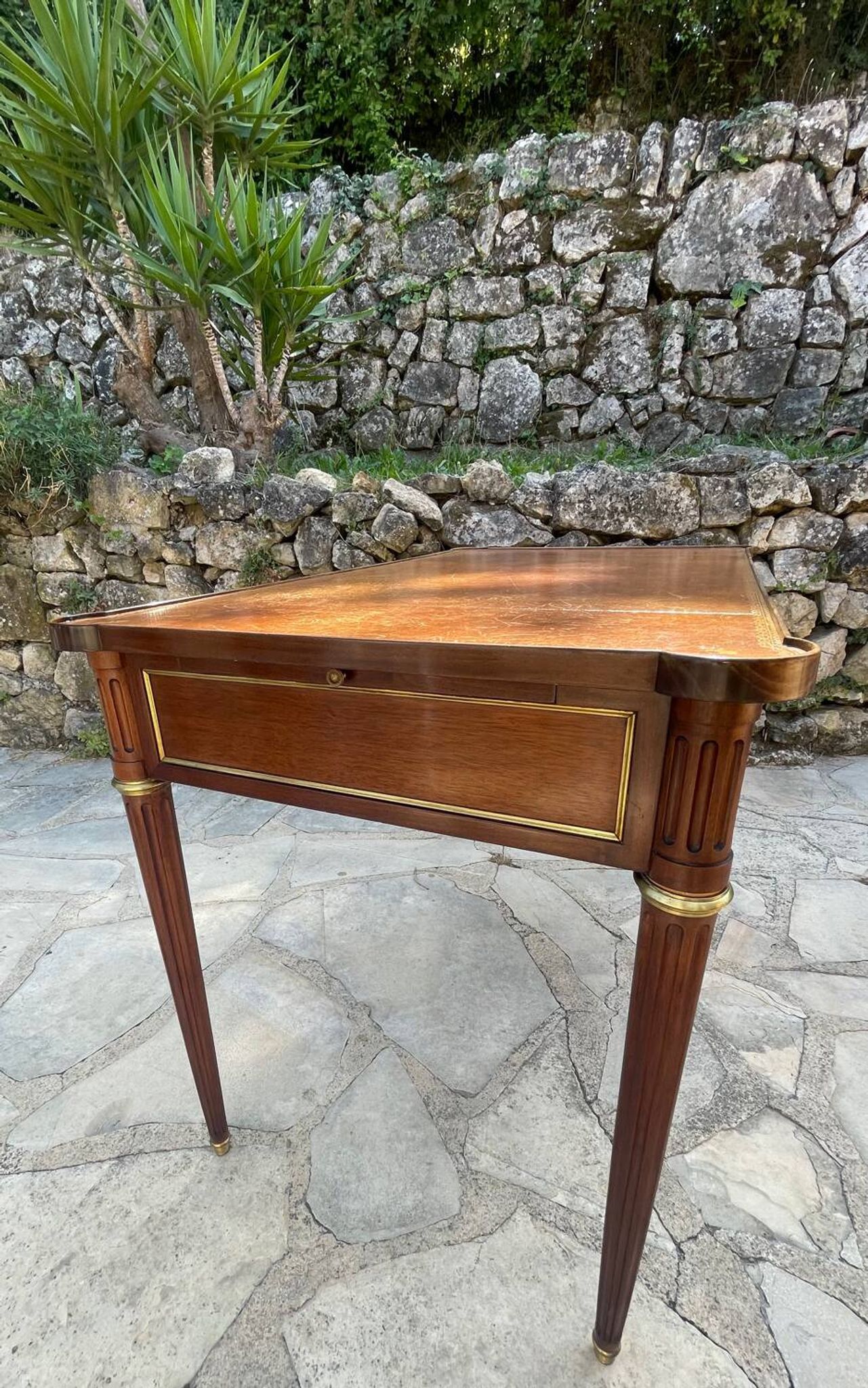 Louis XVI style mahogany flat desk from the late 19th century