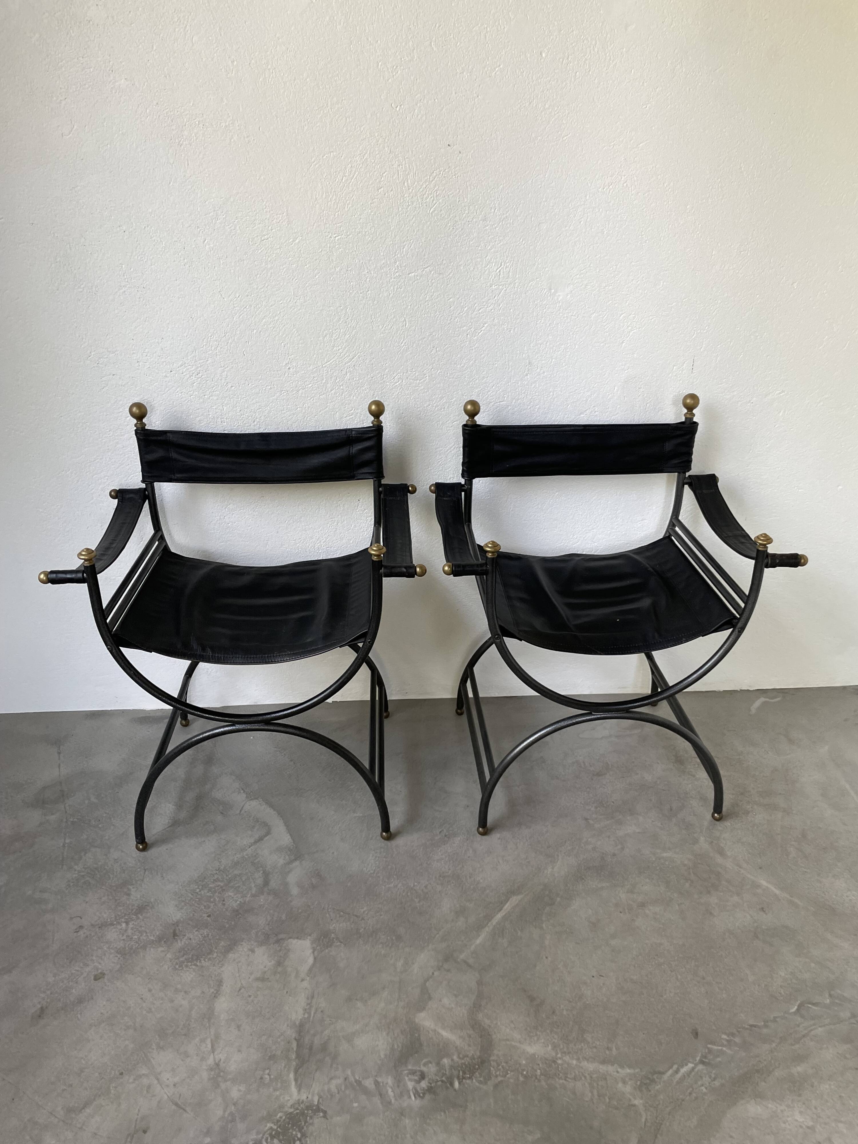 Pair of leather “curule” emperor armchairs