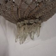 Antique balloon chandelier with pendants, in brass and with mouldings.