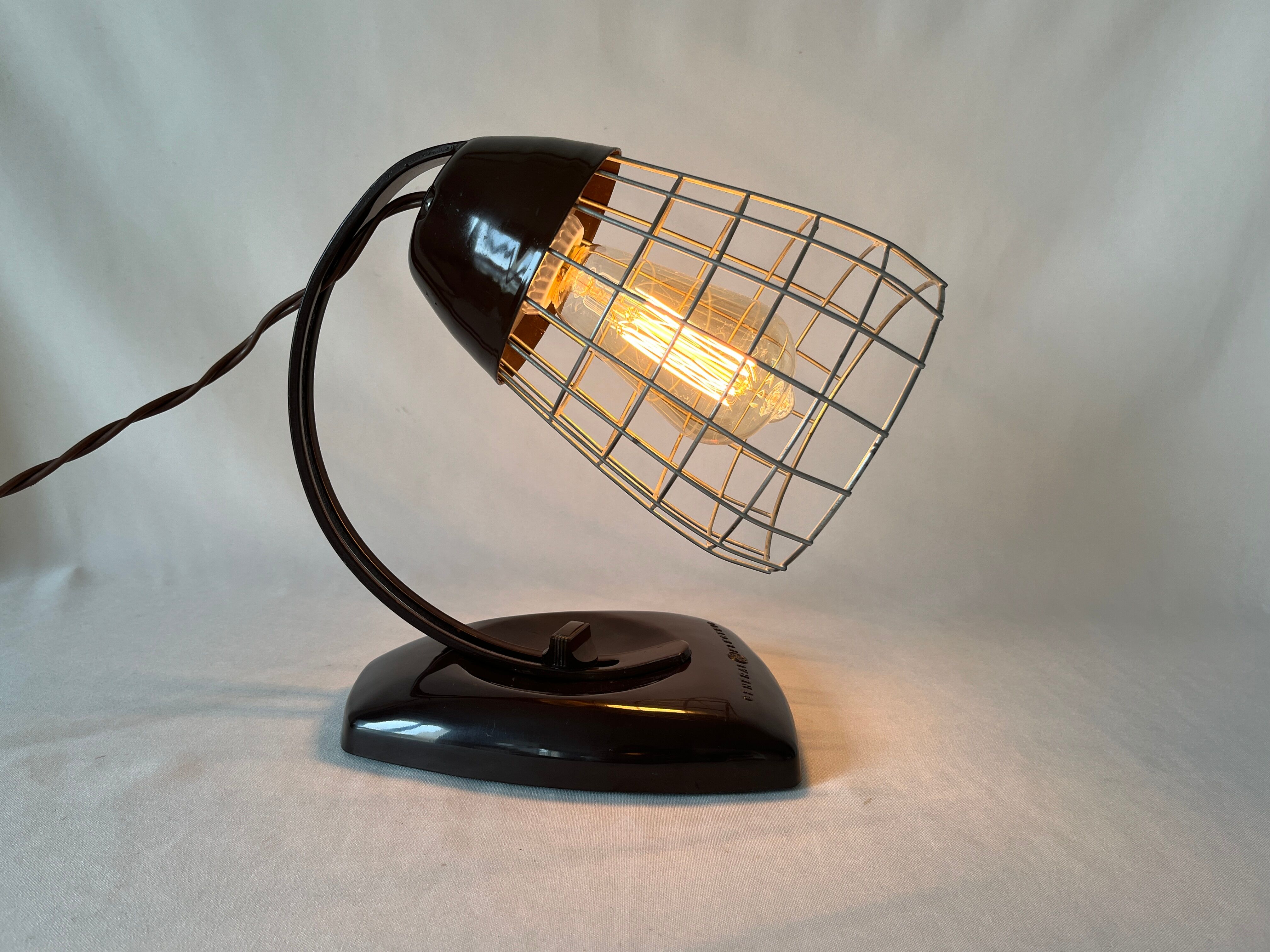 Table lamp Theralux General Electric GE bakelite and industrial metal grid infra red 1930