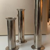 Three silver metal candle holders