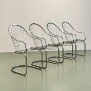 Set of four chrome cantilever dining chairs, 1970s