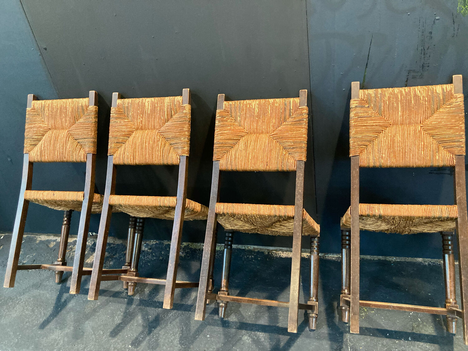 Four straw chairs