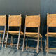 Four straw chairs