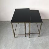 Pull-out tables in glass and brass