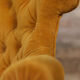 Yellow velvet padded toad sofa and wooden feet